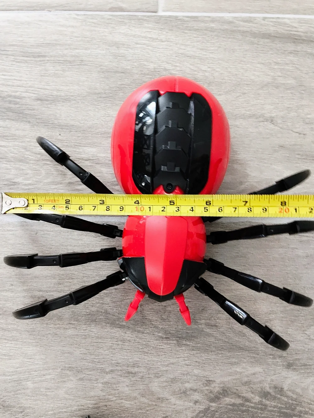 Remote-Controlled Red and Black Spider Controller – Interactive VR Accessory